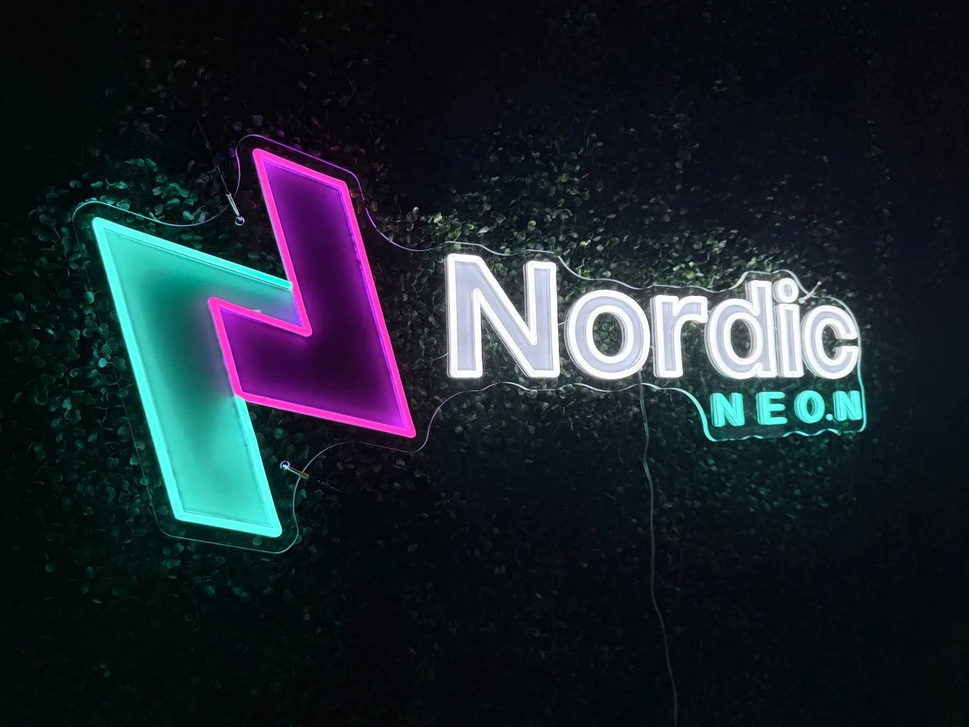 Multi-coloured logo sign on a wall